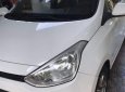 Hyundai Grand i10   2014 - Cần bán lại xe Hyundai Grand i10 đời 2014, màu trắng, nhập khẩu nguyên chiếc xe gia đình
