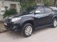 Toyota Fortuner 2014 - Cần bán gấp Toyota Fortuner đời 2014, màu đen chính chủ, giá 745tr