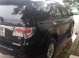 Toyota Fortuner 2014 - Cần bán gấp Toyota Fortuner đời 2014, màu đen chính chủ, giá 745tr