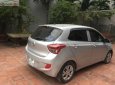 Hyundai Grand i10  1.0 MT Base 2015 - Bán xe Hyundai Grand i10 1.0 MT Base năm 2015, màu bạc, xe nhập chính chủ