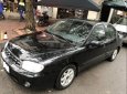 Kia Spectra   2004 - Bán xe Kia Spectra đời 2004, màu đen, số sàn, 135 triệu