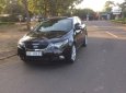 Kia Forte 2010 - Cần bán Kia Forte 2010, màu đen xe gia đình