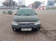 Ford Laser Ghia 2004 - Bán Ford Laser Ghia 2004, màu đen như mới, giá tốt