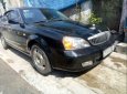 Daewoo Magnus   2004 - Bán Daewoo Magnus đời 2004, màu đen, nhập khẩu  