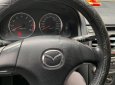 Mazda 6 2.0 MT 2003 - Cần bán xe Mazda 6 2.0 MT 2003, màu xám, chính chủ