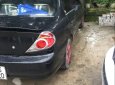 Kia Spectra   2005 - Bán Kia Spectra đời 2005, màu đen, nhập khẩu  