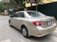 Toyota Corolla altis G 1.8 AT  2010 - Cần bán gấp Toyota Corolla altis G 1.8 AT 2010, màu vàng, xe gia đình