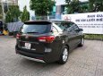 Kia Sedona 3.3L GATH 2015 - Cần bán gấp Kia Sedona 3.3L GATH đời 2015, màu nâu 