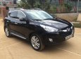 Hyundai Tucson 2.0 AT 4WD 2011 - Cần bán lại xe Hyundai Tucson 2.0 AT 4WD năm 2011, màu đen, nhập khẩu 