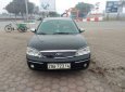 Ford Laser 2004 - Cần bán gấp Ford Laser sản xuất 2004, màu đen xe gia đình, giá chỉ 160 triệu