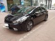 Kia Cerato 1.6 AT  2016 - Bán Kia Cerato 1.6 AT năm sản xuất 2016, màu đen, giá 580tr