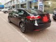 Kia Cerato 1.6 AT  2016 - Bán Kia Cerato 1.6 AT năm sản xuất 2016, màu đen, giá 580tr