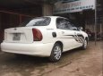 Daewoo Lanos MT 2003 - Cần bán xe cũ Daewoo Lanos MT sản xuất 2003, màu trắng, giá tốt
