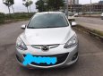 Mazda 2  1.5AT 2011 - Bán xe Mazda 2 1.5AT, sản xuất 2011 màu bạc, lắp ráp trong nước