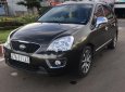 Kia Carens S SX 2.0 MT 2014 - Gia đình cần bán Kia Carens S 2.0 màu nâu, số sàn, sx năm 2014