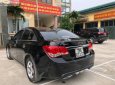 Chevrolet Cruze LT 1.8 MT 2011 - Chính chủ bán ô tô Chevrolet Cruze LT 1.8 MT 2011, màu đen