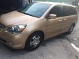 Honda Odyssey 2005 - Cần bán lại xe Honda Odyssey đời 2005, màu vàng xe gia đình giá cạnh tranh