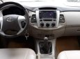 Toyota Innova E 2014 - Bán Toyota Innova E đời 2014, màu vàng cát, còn mới