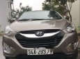 Hyundai Tucson 2011 - Cần bán xe Hyundai Tucson đời 2011, màu nâu, nhập khẩu còn mới