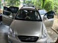 Kia Carens LX 1.6 MT 2010 - Gia đình bán gấp Kia Carens LX 1.6 MT năm 2010, màu vàng