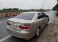 Toyota Camry 2.0E 2016 - Bán xe Camry 2.0E sản xuất năm 2016, số tự động, máy xăng, màu vàng cát, nội thất màu kem, đã đi 45000 km