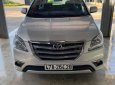 Toyota Innova E 2014 - Cần bán lại xe Toyota Innova E đời 2014, màu bạc