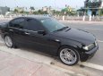 BMW 3 Series   318i  2003 - Bán BMW 3 Series 318i năm 2003, màu đen  