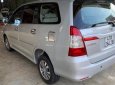 Toyota Innova E 2014 - Cần bán lại xe Toyota Innova E đời 2014, màu bạc