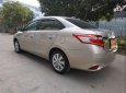 Toyota Vios   2015 - Bán ô tô Toyota Vios đời 2015, màu vàng cát