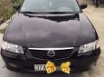 Mazda 626 2003 - Cần bán gấp Mazda 626 đời 2003, màu đen số sàn, giá tốt