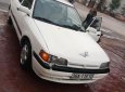 Mazda 323 1.6 MT 1995 - Cần bán Mazda 323 1.6 MT 1995, màu trắng