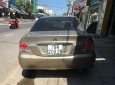 Mitsubishi Lancer   2005 - Bán xe Mitsubishi Lancer 2005, màu vàng còn mới, giá tốt