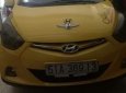 Hyundai Eon   2012 - Bán ô tô Hyundai Eon sản xuất năm 2012, màu vàng, xe nhập