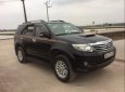 Toyota Fortuner 2014 - Cần bán lại xe Toyota Fortuner sản xuất năm 2014, màu đen, giá 810tr