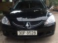 Mitsubishi Lancer 2004 - Bán Mitsubishi Lancer sản xuất 2004, màu đen số tự động, giá chỉ 225 triệu