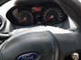 Ford Fiesta 2011 - Cần bán Ford Fiesta đời 2011, màu bạc chính chủ