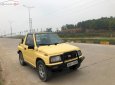 Chevrolet Tracker 1993 - Cần bán Chevrolet Tracker sản xuất 1993, màu vàng, nhập khẩu