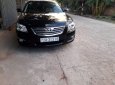 Toyota Camry   2.4G 2009 - Cần bán gấp Toyota Camry 2.4G đời 2009, màu đen, xe gia đình, 578 triệu