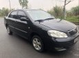 Toyota Corolla altis   J   2002 - Cần bán gấp Toyota Corolla Altis J năm sản xuất 2002, màu đen, phom dáng đẹp, tiết kiệm nhiên liệu