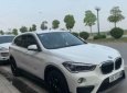 BMW X1   1.8 AT  2016 - Cần bán BMW X1 1.8 AT năm 2016, màu trắng