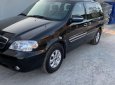 Kia Carnival 2009 - Bán Kia Carnival sản xuất năm 2009, màu đen, xe nhập