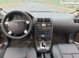 Ford Mondeo  2.5AT 2004 - Bán Ford Mondeo 2.5AT đời 2004, màu nâu, giá chỉ 210 triệu