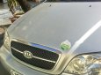 Kia Carnival 2.5 MT 2006 - Cần bán gấp xe Kia Carnival 7 chỗ, Sx 2006, số tay, máy xăng, màu bạ, nội thất màu ghi, đã đi 104000 km