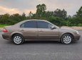 Ford Mondeo  2.5AT 2004 - Bán Ford Mondeo 2.5AT đời 2004, màu nâu, giá chỉ 210 triệu