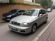 Daewoo Lanos SX 2004 - Cần bán gấp Daewoo Lanos SX 2004, màu bạc