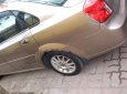 Chevrolet Lacetti   2004 - Bán Chevrolet Lacetti sản xuất 2004, màu vàng cát, giá chỉ 146 triệu