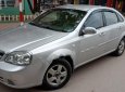 Daewoo Lacetti Ex 2009 - Bán xe Daewoo Lacetti Ex năm 2009, màu bạc xe gia đình 