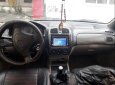 Mazda 323   2002 - Cần bán Mazda 323 đời 2002, màu đen, xe đẹp nguyên bản