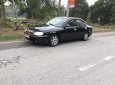 Kia Spectra 2004 - Bán Kia Spectra sản xuất năm 2004, màu đen xe gia đình