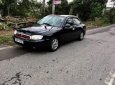 Kia Spectra 2004 - Bán Kia Spectra sản xuất năm 2004, màu đen xe gia đình